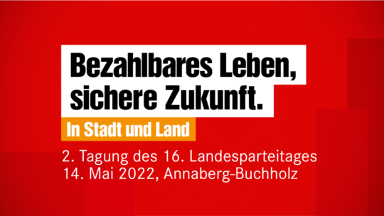 Text auf rotem Grund: Bezahlbares Leben - Sichere Zukunft. In Stadt und Land. 2. tagung des 16. landesparteitages in Annaberg-Buchholz